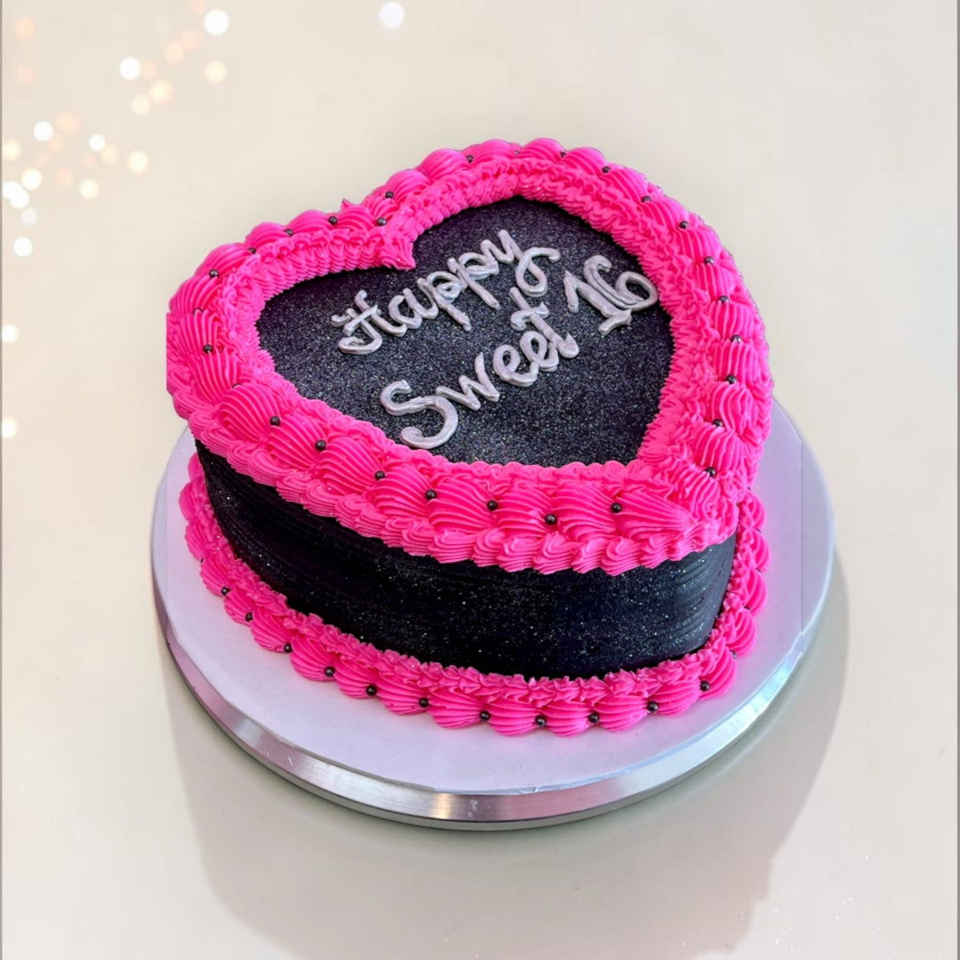 All Black with Pink borders Heart shaped cake