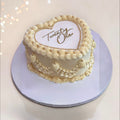 Off White Heart shaped cake