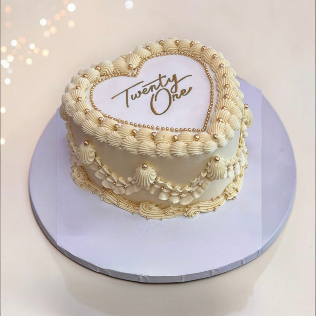 Off White Heart shaped cake