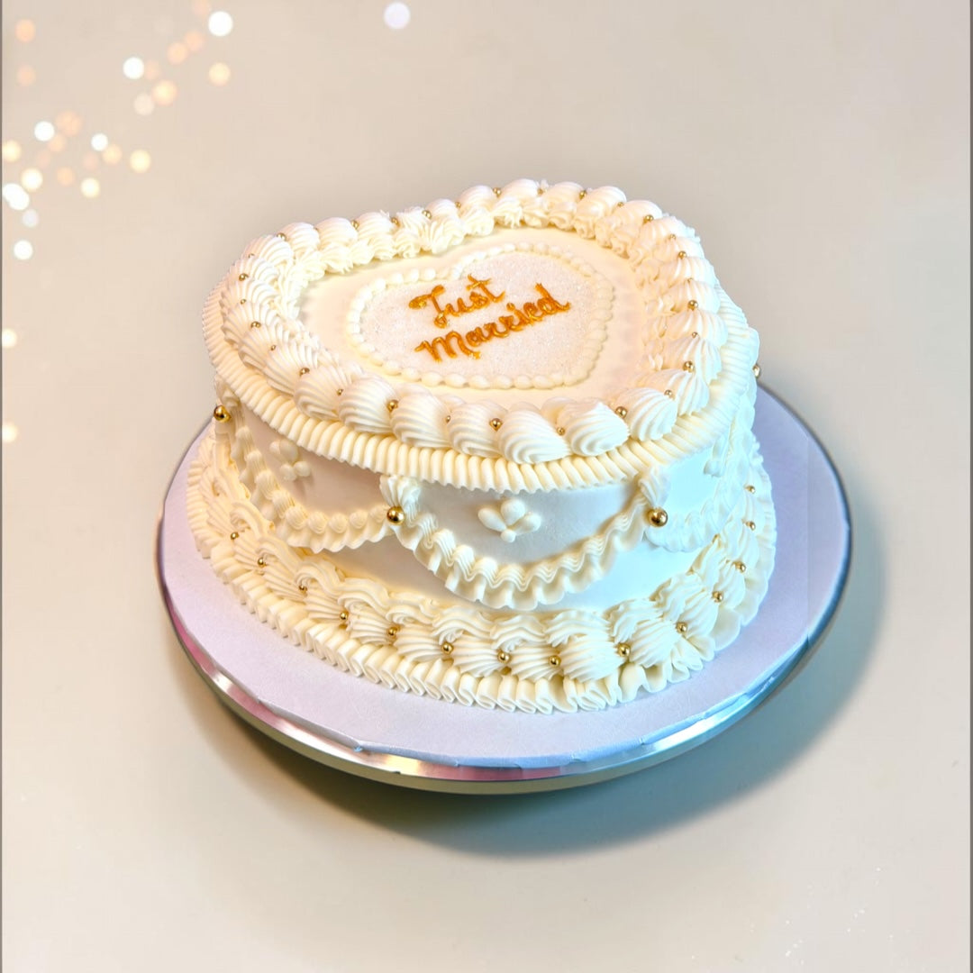 Elegant Newly Weds Heart shaped cake